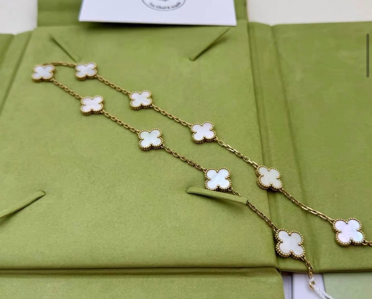 Van Cleef & Arpels vintage Alhambra necklace 10 motifs in gold, mop Year 2023. Comes w box & cert
