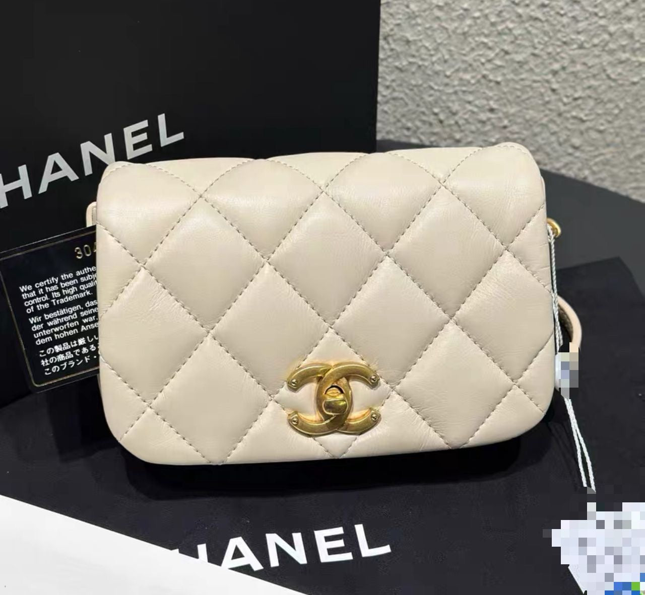 CHANEL Mini Flap Bag in Beige Lambskin GHW - series 30 (2020).
Kept Unused